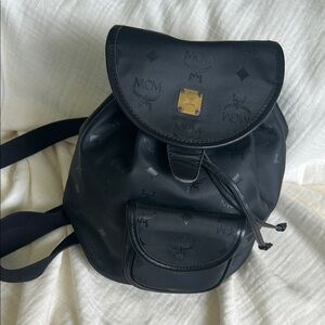 MCM Black Leather Backpack with Gold Detail